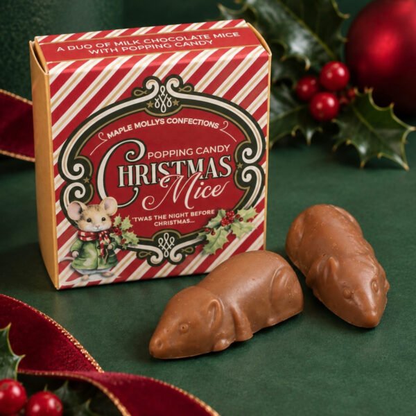 Milk chocolate mice with popping candy in a Christmas gift box