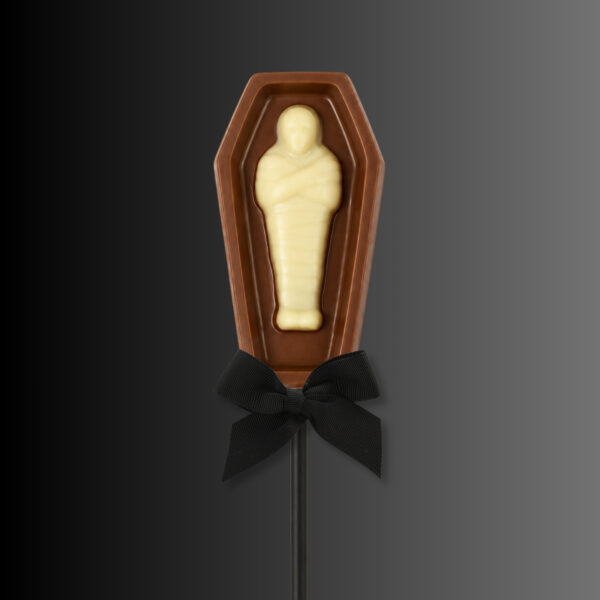 Milk and white chocolate coffin shaped lollipop with inset mummy
