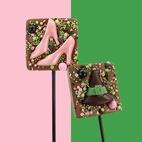 Milk chocolate lollipop topped with a witches hat or pink shoes and sugar sprinkles